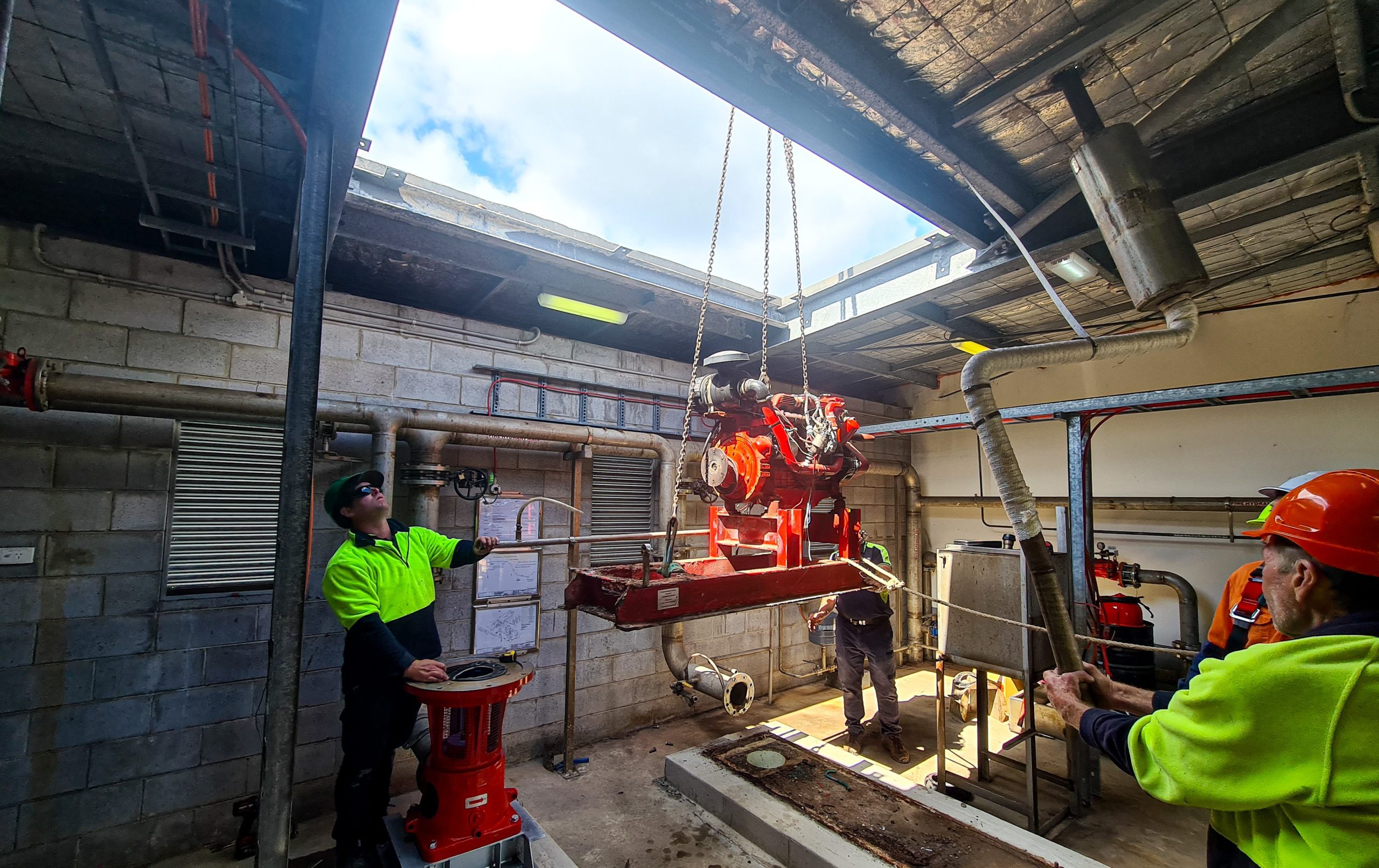 Old Fire system being craned out of shed.